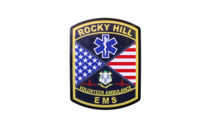 A Rocky Hill EMS Volunteer Ambulance badge featuring an American flag, a medical star of life, a state emblem, and heart rate lines, all framed by black and gold borders.